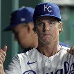 
              Kansas City Royals starting pitcher Zack Greinke greets teammates ion the dugout after coming out of the baseball game during the sixth inning against the Minnesota Twins Tuesday, Sept. 20, 2022, in Kansas City, Mo. (AP Photo/Charlie Riedel)
            