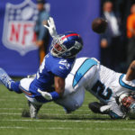 
              New York Giants' Adoree' Jackson (22), left, breaks up a pass intended for Carolina Panthers' DJ Moore (2) during the first half an NFL football game, Sunday, Sept. 18, 2022, in East Rutherford, N.J. (AP Photo/John Munson)
            