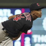 
              Cleveland Guardians pitcher Triston McKenzie watches a fifth inning pitch against the Minnesota Twins in the sixth inning of a baseball game, Saturday, Sept 10, 2022, in Minneapolis. (AP Photo/Jim Mone)
            