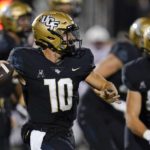 
              Central Florida quarterback John Rhys Plumlee (10) looks for a receiver against Louisville during the first half of an NCAA college football game, Friday, Sept. 9, 2022, in Orlando, Fla. (AP Photo/John Raoux)
            