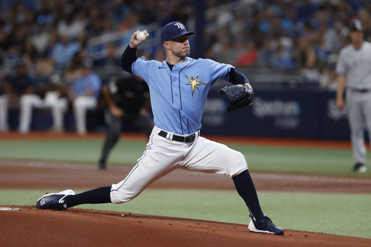 Tampa Bay Rays starting pitcher Corey Kluber throws to a New York Yankees batter during the first i...