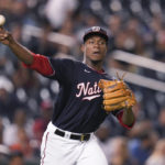 
              Washington Nationals starting pitcher Josiah Gray throws to first base for the out on a grounder by Miami Marlins' Joey Wendle uring the third inning of a baseball game at Nationals Park, Friday, Sept. 16, 2022, in Washington. (AP Photo/Jess Rapfogel)
            