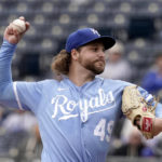 
              Kansas City Royals starting pitcher Jonathan Heasley throws during the first inning of a baseball game against the Minnesota Twins Thursday, Sept. 22, 2022, in Kansas City, Mo. (AP Photo/Charlie Riedel)
            
