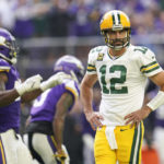 
              Green Bay Packers quarterback Aaron Rodgers (12) reacts after a Minnesota Vikings defensive stop on fourth down during the first half of an NFL football game, Sunday, Sept. 11, 2022, in Minneapolis. (AP Photo/Abbie Parr)
            