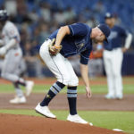 
              Tampa Bay Rays starting pitcher Shane McClanahan reaches for the rosin bag as Houston Astros' Jeremy Pena runs around the bases following his three-run home run during the third inning of a baseball game Tuesday, Sept. 20, 2022, in St. Petersburg, Fla. (AP Photo/Chris O'Meara)
            