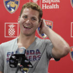 
              Florida Panthers' Matthew Tkachuk smiles during the NHL hockey team's media day, Wednesday, Sept. 21, 2022, in Coral Springs, Fla. (AP Photo/Marta Lavandier)
            