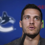 
              Vancouver Canucks forward Bo Horvat responds to questions during a news conference ahead of the NHL hockey team's training camp,  Wednesday, Sept. 21, 2022, in in Vancouver, British Columbia. (Darryl Dyck/The Canadian Press via AP)
            