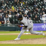 
              Cleveland Guardians relief pitcher Emmanuel Clase (48) throws to a Chicago White Sox batter during the ninth inning of a baseball game Thursday, Sept. 22, 2022, in Chicago. (AP Photo/David Banks)
            