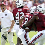 
              South Carolina head coach Shane Beamer celebrates a successful fake punt during the first half of an NCAA college football game against Georgia on Saturday, Sept. 17, 2022 in Columbia, S.C. (AP Photo/Artie Walker Jr.)
            