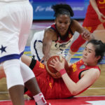 
              United States' Alyssa Thomas looks to take the ball from China's Pan Zhenqi during their game at the women's Basketball World Cup in Sydney, Australia, Saturday, Sept. 24, 2022. (AP Photo/Mark Baker)
            