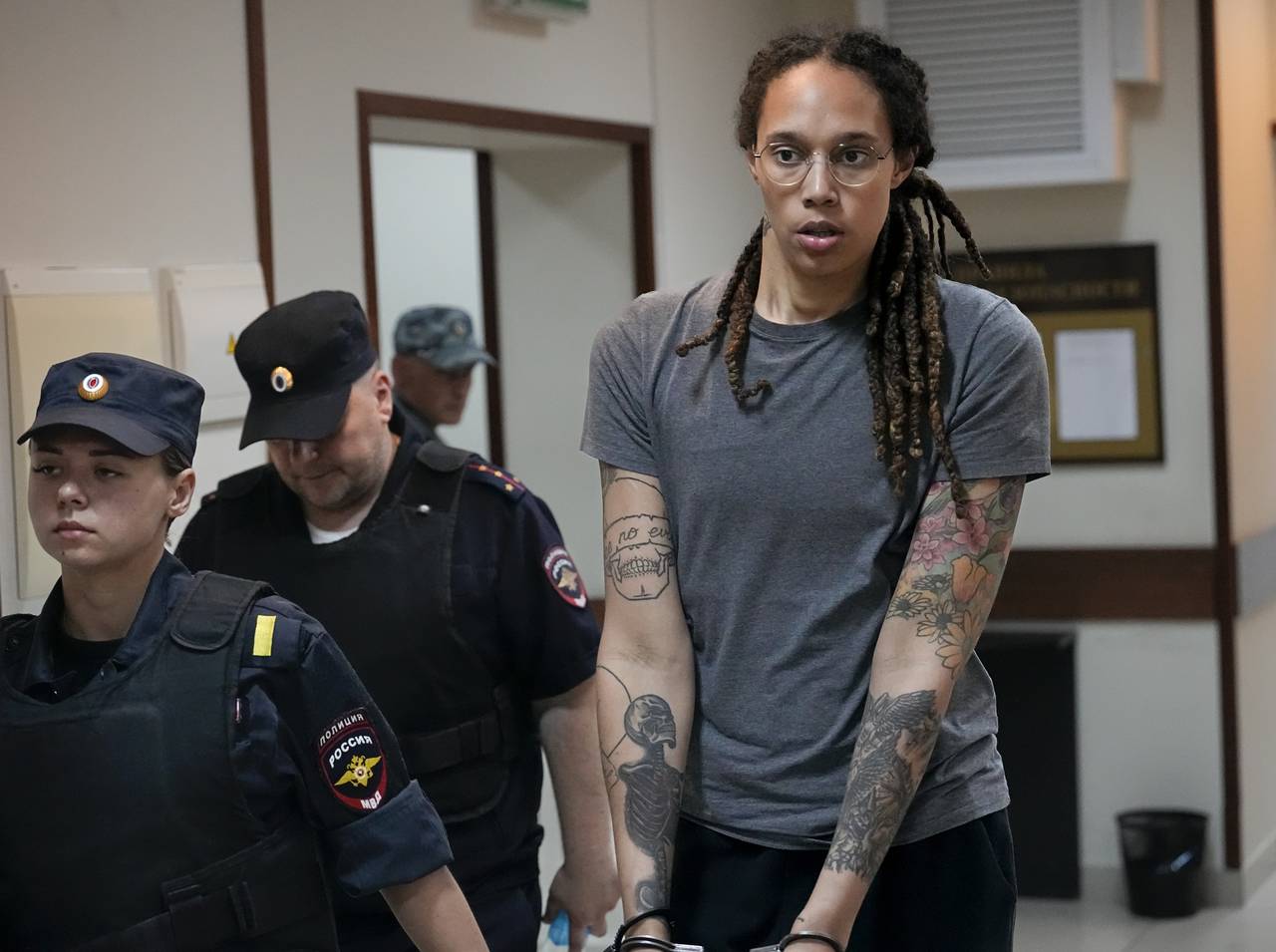 FILE - WNBA star and two-time Olympic gold medalist Brittney Griner is escorted from a court room a...