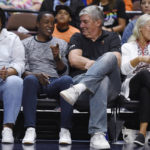 
              Isiah Thomas, second from left, speaks with Bill Laimbeer before Game 3 of basketball's WNBA Finals between the Las Vegas Aces and the Connecticut Sun on Thursday, Sept. 15, 2022, in Uncasville, Conn. (AP Photo/Jessica Hill)
            