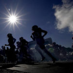 
              Kansas players run onto the field before an NCAA college football game against Duke, Saturday, Sept. 24, 2022, in Lawrence, Kan. (AP Photo/Charlie Riedel)
            