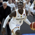 
              Germany's Dennis Schroeder plays the ball during the Eurobasket quarterfinal basketball match between Germany and Greece in Berlin, Germany, Tuesday, Sept. 13, 2022. (AP Photo/Michael Sohn)
            