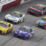 
              Christoper Bell (21), Joey Lagano (22), William Byron (24), Kyle Busch (18) and Tyler Reddick (8) compete in the NASCAR Southern 500 auto race, Sunday, Sept. 4, 2022, in Darlington, S.C. (AP Photo/Sean Rayford)
            