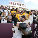 
              Appalachian State offensive lineman Bucky Williams, right, celebrates with Nate Noel, left, after the team's 17-14 win over No. 6 Texas A&M in an NCAA college football game Saturday, Sept. 10, 2022, in College Station, Texas. (AP Photo/Sam Craft)
            