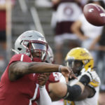 
              Washington State quarterback Cameron Ward throws a pass during the first half of an NCAA college football game against Idaho, Saturday, Sept. 3, 2022, in Pullman, Wash. (AP Photo/Young Kwak)
            