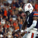 
              Auburn quarterback T.J. Finley (1) reacts after scoring a touchdown against San Jose State during the second half of an NCAA college football game Saturday, Sept. 10, 2022, in Auburn, Ala. (AP Photo/Butch Dill)
            