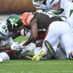 
              New York Jets' Justin Hardee (34) recovers an onside kickoff against the Cleveland Browns during the second half of an NFL football game, Sunday, Sept. 18, 2022, in Cleveland. (AP Photo/David Richard)
            