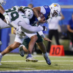 
              San Jose State quarterback Chevan Cordeiro, right, runs the ball for a two-yard touchdown against Portland State during the second half of an NCAA college football game in San Jose, Calif., Thursday, Sept. 1, 2022. (AP Photo/Godofredo A. Vásquez)
            