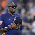 
              Houston Astros manager Dusty Baker Jr. stands for a moment of silence in memory of 9/11 before a baseball game against the Los Angeles Angels, Sunday, Sept. 11, 2022, in Houston. (AP Photo/Kevin M. Cox)
            