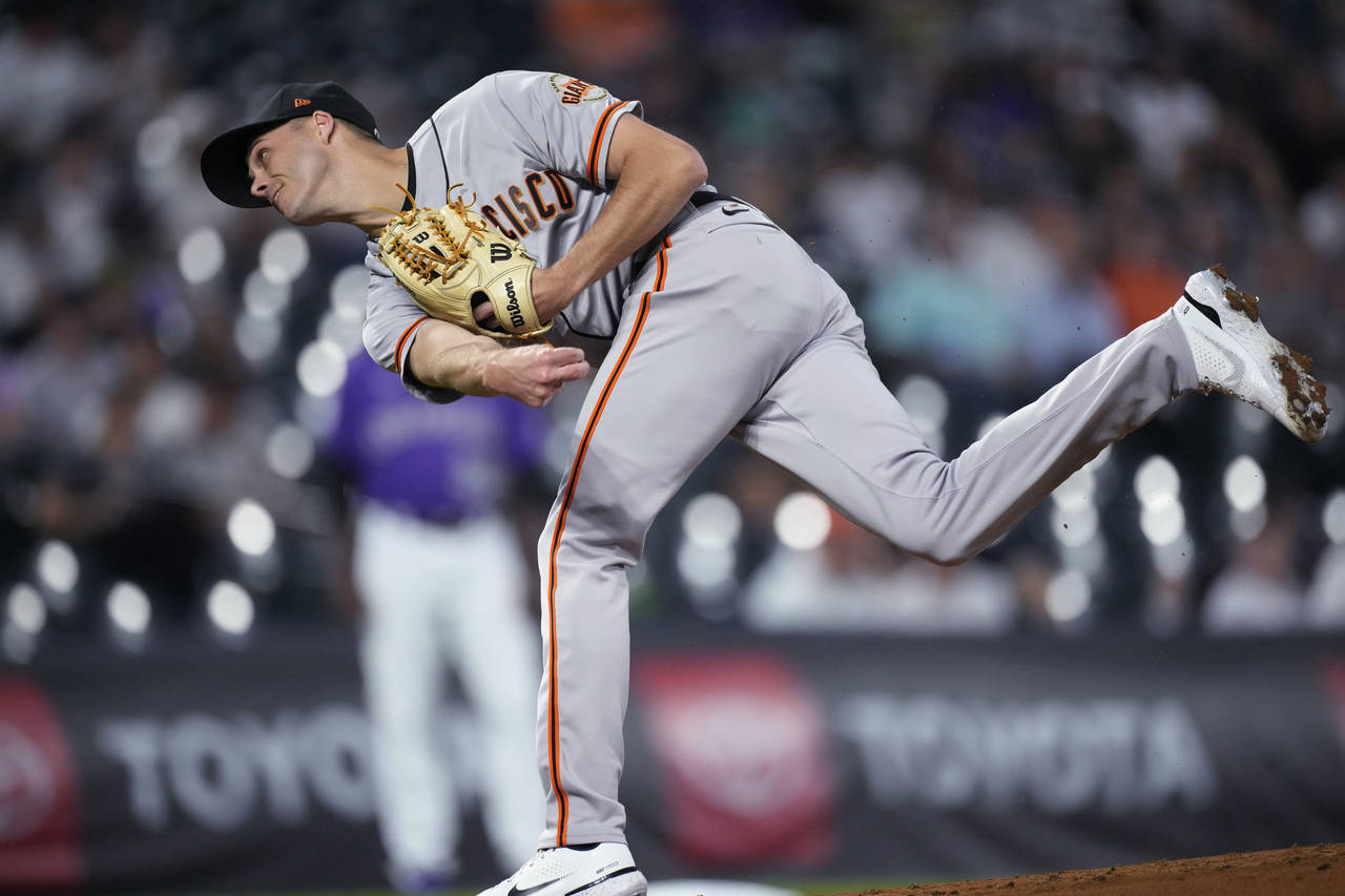 San Francisco Giants relief pitcher Tyler Rogers works against the Colorado Rockies during the seco...