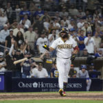 
              San Diego Padres' Jorge Alfaro reacts after drawing a walk with the bases loaded, allowing the winning run to score during the 10th inning against the Los Angeles Dodgers in a baseball game Tuesday, Sept. 27, 2022, in San Diego. (AP Photo/Gregory Bull)
            
