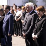 
              German President Frank-Walter Steinmeier, second from right, his wife Elke Buedenbender, right, and Israeli President Isaac Herzog, second left wit his wife Michal Herzog, left, attend a wreath laying ceremony to commemorate the victims of the attack by Palestinian militants on the 1972 Munich Olympics in Fuerstenfeldbruck near Munich, Germany, Monday, Sept. 5, 2002. The German and Israeli presidents are to join relatives of the 11 Israeli athletes killed in the attack by Palestinian militants on the commemoration event. (Sven Hoppe/dpa via AP)
            