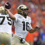 
              Purdue quarterback Aidan O'Connell throws a pass against Syracuse during the first half of an NCAA college football game in Syracuse, N.Y., Saturday, Sept. 17, 2022. (AP Photo/Adrian Kraus)
            