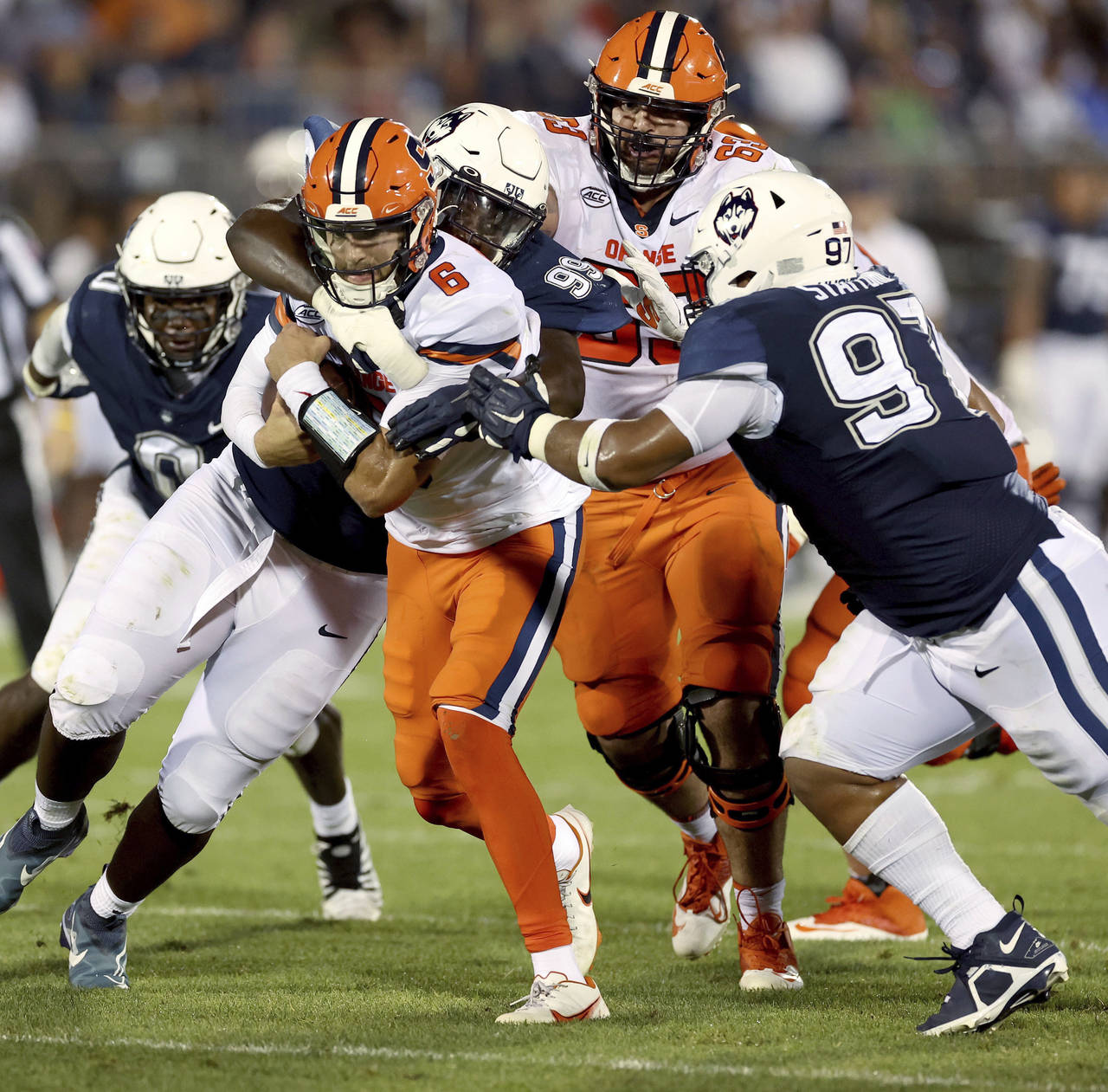 Syracuse quarterback Garrett Shrader (6) is tackled during an NCAA college football game against Co...