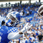 
              Kentucky wide receiver Chris Lewis reaches out and misses a pass in the end zone during the second half of an NCAA college football game against Youngstown State in Lexington, Ky., Saturday, Sept. 17, 2022. (AP Photo/Michael Clubb)
            