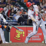 
              Los Angeles Angels' Mike Trout, right, connects for a two-un home run in front of Houston Astros catcher Martin Maldonado, left, during the sixth inning of a baseball game Friday, Sept. 9, 2022, in Houston. (AP Photo/Michael Wyke)
            