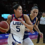 
              United States' Kelsey Plum attempt to win past Serbia's Sasa Cado during their quarterfinal game at the women's Basketball World Cup in Sydney, Australia, Thursday, Sept. 29, 2022. (AP Photo/Mark Baker)
            