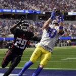 
              Los Angeles Rams wide receiver Cooper Kupp (10) makes a catch in the end zone for a touchdown during the first half of an NFL football game as Atlanta Falcons cornerback Casey Hayward (29) defends, Sunday, Sept. 18, 2022, in Inglewood, Calif. (AP Photo/Mark J. Terrill)
            