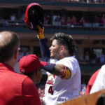 
              St. Louis Cardinals' Yadier Molina tips his cap after hitting his second home run of a baseball game against the Washington Nationals during the fourth inning Thursday, Sept. 8, 2022, in St. Louis. Molina also homered in the second. (AP Photo/Jeff Roberson)
            