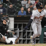 
              Detroit Tigers' Riley Greene watches his sacrifice fly to Chicago White Sox center fielder Adam Engel during the seventh inning of a baseball game in Chicago, Friday, Sept. 23, 2022. (AP Photo/Nam Y. Huh)
            