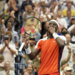 
              Frances Tiafoe, of the United States, reacts after winning a tie breaker against Andrey Rublev, of Russia, during the quarterfinals of the U.S. Open tennis championships, Wednesday, Sept. 7, 2022, in New York. (AP Photo/Mary Altaffer)
            