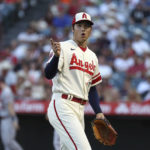 
              Los Angeles Angels starting pitcher Shohei Ohtani reacts after the last out of the first inning of a baseball game against the Houston Astros, Saturday, Sept. 3, 2022, in Anaheim, Calif. (AP Photo/Raul Romero Jr.)
            