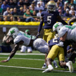 
              Marshall running back Khalan Laborn dives in for a touchdown against Notre Dame during the first half of an NCAA college football game in South Bend, Ind., Saturday, Sept. 10, 2022. (AP Photo/Michael Conroy)
            