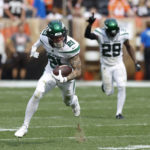 
              New York Jets safety Ashtyn Davis runs with the ball after making an interception of a pass by Cleveland Browns quarterback Jacoby Brissett with time running down during the second half of an NFL football game, Sunday, Sept. 18, 2022, in Cleveland. The Jets won 31-30. (AP Photo/Ron Schwane)
            