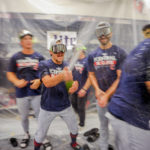 
              Cleveland Guardians players celebrate winning the American League Central after defeating the Texas Rangers in a baseball game in Arlington, Texas on Sunday, Sept. 25, 2022. (AP Photo/Gareth Patterson)
            