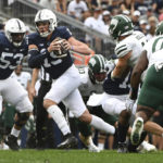 
              Penn State quarterback Drew Allar (15) scrambles away from Ohio linebacker Kyle Kelly (48) during the second half of an NCAA college football game , Saturday, Sept. 10, 2022, in State College, Pa. (AP Photo/Barry Reeger)
            