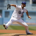 
              Los Angeles Dodgers starting pitcher Clayton Kershaw throws to a San Francisco Giants. batter during the second inning of a baseball game Wednesday, Sept. 7, 2022, in Los Angeles. (AP Photo/Marcio Jose Sanchez)
            
