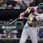 
              Minnesota Twins' Luis Arraez hits a single during the first inning of the team's baseball game against the Chicago White Sox in Chicago, Friday, Sept. 2, 2022. (AP Photo/Nam Y. Huh)
            