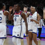 
              United States players celebrate after defeating China in their game at the women's Basketball World Cup in Sydney, Australia, Saturday, Sept. 24, 2022. (AP Photo/Mark Baker)
            