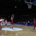 
              United States' Breanna Stewart, center, shoots a free throw against Canada during their semifinal game at the women's Basketball World Cup in Sydney, Australia, Friday, Sept. 30, 2022. (AP Photo/Rick Rycroft)
            