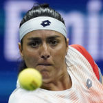 
              Ons Jabeur, of Tunisia, returns a shot to Ajla Tomljanovic, of Austrailia, during the quarterfinals of the U.S. Open tennis championships, Tuesday, Sept. 6, 2022, in New York. (AP Photo/Julia Nikhinson)
            