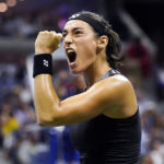 
              Caroline Garcia, of France, celebrates after winning a point against Coco Gauff, of the United States, during the quarterfinals of the U.S. Open tennis championships, Tuesday, Sept. 6, 2022, in New York. (AP Photo/Charles Krupa)
            