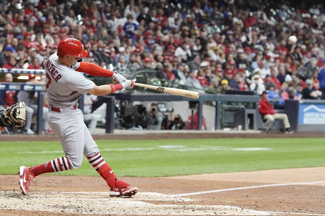 St. Louis Cardinals' Andrew Knizner hits a two-run home run during the fourth inning of a baseball ...