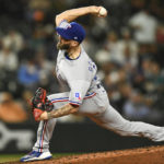 
              Texas Rangers relief pitcher Joe Barlow throws to a Seattle Mariners batter during the eighth inning of a baseball game Wednesday, Sept. 28, 2022, in Seattle. (AP Photo/Caean Couto)
            